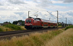 182 020 hat bereits den Haltepunkt Zschortau verlassen und beschleunigt am 21.06.16 ihre S2 nach Dessau nun wieder.