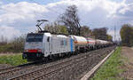 Lokomotive 186 448 mit einem Kesselwagenzug am 10.04.2022 in Bornheim.