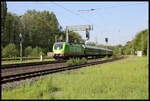 Flixtrain mit Zuglok 242.516 erreicht hier am 13.5.2023 auf der Fahrt nach Norden um 9.39 Uhr den Bahnhof Hasbergen an der Rollbahn.