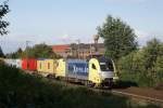 ES 64 U2-009 mit Containerzug --> HLI in Limmer am 02.10.2008