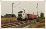 ES 64 U2 -035 der WLC mit Khne und Nagel Werbung mit einem Containerzug gen Regensburg in Taimering am 30.09.2010.  