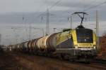 CargoServ ES 64 U2-082 (i.E. fr RTS) am 11.12.11 mit einem Kesselwagenzug bei der Durchfahrt durch Ratingen-Lintorf.