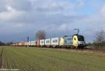 ES 64 U2-007 (182 507) ist am 09.02.12 mit einem aus Bremerhaven kommenden Containerzug bei Bremen Mahndorf auf dem Weg gen Sden.