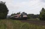 HKX 1801 nach Hamburg hat am 4.9.2013 nur vier Wagen am Haken,  als er um 9.10 Uhr gerade den Lengericher Tunnel verlassen hat und  am Wasserwerk in Schollbruch vorbei gen Osnabrck unterwegs ist.