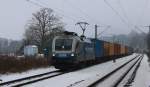 182 912-6 der MWB/EVB mit Containerzug in Fahrtrichtung Norden.