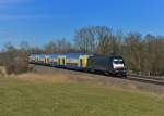 182 509 mit einem Meridian-Ersatzzug am 25.02.2014 bei Hilperting.