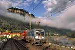 Am Morgen des 7.9.2015 verzieht sich langsam der Nebel im Elbtal und gibt die Sicht frei auf die Festung Königstein,in diesem schönen Moment fährt die S1 Meissen-Triebischtal bespannt