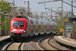 182 001-8 (Siemens ES64U2) passiert die Bahnsteige des Hp Magdeburg Herrenkrug.