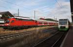 Hier links 182 024 mit einer RB20 (RB16333) von Eisenach nach Halle(Saale) Hbf. und rechts 650 517-2  Meininger Dampflok Verein  als STB92930 von Eisenach nach Grimmenthal, diese beiden Züge standen am 20.8.2014 in Eisenach.