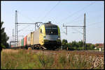 Die Siemens Dispo Lok ES64U2-012 ist hier am 12.9.2006 bei Dedensen mit einem Container Zug in Richtung Seelze unterwegs.