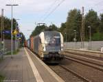 ES 64 U2 - 020 (182 520-7) MRCE Dispolok GmbH für WLC - Wiener Lokalbahnen Cargo GmbH mit einem Containerzug in Bienenbüttel, nach der Überholung durch ICE 789 und IC 2373, ging die