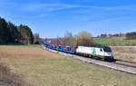 183 717 mit einem leeren Autozug am 30.03.2021 bei Sinngrün.