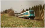 183 005 mit dem ALX nach Mnchen Hbf am 31.03.2011 in Kfering