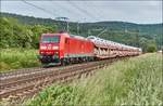 185 062-7 ist mit einen Autozug bei Reilos am 08.06.2017 zu sehen.