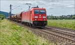 185 259-9 ist mit einen Schüttgutzug bei Reilos am 08.06.2017 zu sehen.