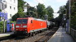 185 144-3 DB kommt aus Richtung Köln,Aachen-Hbf und fährt durch Aachen-Schanz mit einem Ölleerzug aus 	Basel-SBB(CH) nach Antwerpen-Petrol(B)  und fährt in Richtung Aachen-West.