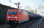 185 309-2 mit Kesselwagenzug (UN-Nr.: 30/1202 = Dieselkraftstoff oder Gasöl oder Heizöl (leicht)) am 20.02.18 Durchfahrt Bf. Berlin-Hohenschönhausen.