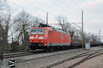 DB Lok 185 086-6 durchfährt den Bahnhof Kaiseraugst.