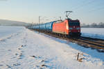 185 173-2 mit einem Kesselwagenzug bei Seubersdorf Richtung Regensburg, 21.01.2017