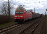 185 393-6 DB kommt mit einem Aluzug aus Göttingen nach Nievenheim und kommt aus Richtung Neuss-Hbf,Neuss-Süd,Norf,Neuss-Allerheiligen und fährt gleich in den Güterbahnhof von Nievenheim ein.
Aufgenommen vom Bahnsteig 1 in Nievenheim. 
Bei Sonnenschein und Regenwolken am Nachmittag vom 31.3.2018.