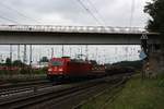 # Duisburg-Entenfang 6  Die 185 215-1 der DB Cargo mit einem Güterzug aus Norden kommend durch Duisburg-Entenfang in Richtung Ratingen-Lintorf.