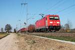 Mit einem gemischten Güterzug (Mannheim Rbf - Basel Bad Rbf) fuhr am 27.03.2017 die 185 403-3 bei Müllheim (Baden) auf der KBS 703 in Richtung Zielbahnhof.
