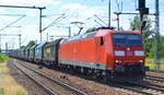 185 155-9 mit einem Ganzzug polnischen Teleskophaubenwagen für Coiltransporte am 12.06.18 Bf. Flughafen Berlin-Schönefeld.