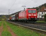 185 058-5 mit Schienenkran in Fahrtrichtung Norden. Aufgenommen in Ludwigsau-Friedlos am 16.04.2016.
