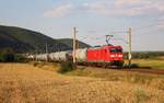 185 010-6 zu sehen mit einem Kesselzug am 30.07.18 in Etzelbach.
