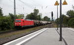 185 342-3 DB  kommt mit einem Kesselzug aus Antwerpen-BASF(B) nach Ludwigshafen-BASF(D) und kommt aus Richtung Aachen-West,Aachen-Schanz,Aachen-Hbf und fährt durch Aachen-Rothe-Erde in Richtung Eilendorf,Stolberg-Hbf(Rheinland),Eschweiler-Hbf,Langerwehe,Düren,Merzenich,Buir,Horrem,Kerpen-Köln-Ehrenfeld,Köln-West,Köln-Süd. Aufgenommen vom Bahnsteig 1 in Aachen-Rothe-Erde. 
Bei Wolken am Abend vom 3.9.2018. 