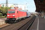 Durchfahrt am 12.04.2017 von 185 312-6 mit einem Autozug nach Dillingen (Saar) durch den Bahnhof von Völklingen und wird in Kürze den Zielbahnhof erreichen.