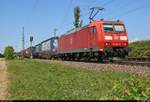 KLV-Zug mit 185 084-1 DB durchfährt den Haltepunkt Auggen auf der Bahnstrecke Mannheim–Basel (Rheintalbahn | KBS 703) Richtung Basel (CH).