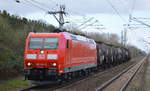 DB Cargo Deutschland AG mit  185 014-8  [NVR-Nummer: 91 80 6185 014-8 D-DB] mit einem kurzen Kesselwagenzug (Schwefel, geschmolzen) am 19.03.19 Bf. Berlin-Hohenschönhausen.