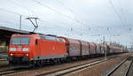 DB Cargo Deutschland AG mit  185 166-6  [NVR-Number: 91 80 6185 166-6 D-DB] und einem Güterzug für Coil-Transporte am 28.03.19 Bf. Flughafen Berlin-Schönefeld.