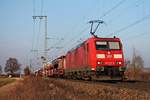 Am 21.02.2018 fuhr 185 179-9 mit einem gemischte Güterzug (Mannheim Rbf - Basel Bad Rbf) nördlich von Müllheim (baden) durchs Rheintal in Richtung Zielbahnhof.