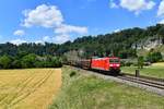 185 080 mit einem Güterzug am 18.06.2019 bei Hagenacker. 