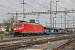 DB Lok 185 136-9 durchfährt den Bahnhof Pratteln.