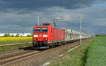 185 014 schleppte am 25.04.20 einen Schüttgutzug über das Gegengleis durch Rodleben Richtung Magdeburg.