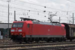 DB Lok 185 099-9 durchfährt den badischen Bahnhof.