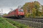 185 216-9 ist am 20.10.2021 mit einen gemischten Güterzug in Vollmerz unterwegs