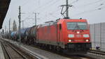 DB Cargo AG [D] mit  185 294-6  [NVR-Nummer: 91 80 6185 294-6 D-DB] und gemischtem Kesselwagenzug am 07.01.22 Berlin Karow.