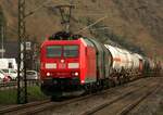 185 030 der DM mit Kesselwagen bei Oberlahnstein am 01.03.2022