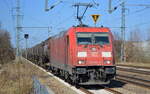 DB Cargo AG [D] mit  185 308-4  [NVR-Nummer: 91 80 6185 308-4 D-DB] und Kesselwagenzug am 24.03.22 Durchfahrt Bf. Golm.