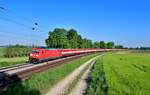 185 395 mit einem Güterzug am 18.05.2022 bei Langenisarhofen.