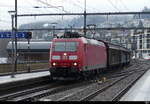 DB - 185 107-0 mit Güterwagen unterwegs in Wädenswil am 12.03.2023