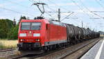 DB Cargo AG [D] mit ihrer  185 171-6  [NVR-Nummer: 91 80 6185 171-6 D-DB] und einem Kesselwagenzug am 29.06.23 Durchfahrt Bahnhof Lutherstadt Wittenberg-Piesteritz.