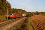185 319 DB Cargo mit einem gemischten Güterzug bei Hagenbüchach Richtung Würzburg, 30.03.2021
