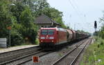 DB 185 064-3 mit einem gemischten Güterzug Richtung Hannover, am 11.07.2023 in Sarstedt.