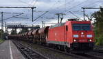 DB Cargo AG, Mainz mit ihrer  185 308-4  (NVR:  91 80 6185 308-4 D-DB ) und einem Schotterzug (leer) am 07.11.23 Höhe Bahnhof Niederndodeleben.