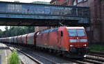 DB Cargo AG, Mainz mit ihrer  185 157-5  [NVR-Nummer: 91 80 6185 157-5 D-DB] und einem Coilzug am 21.05.24 Höhe Bahnhof Hamburg-Harburg.